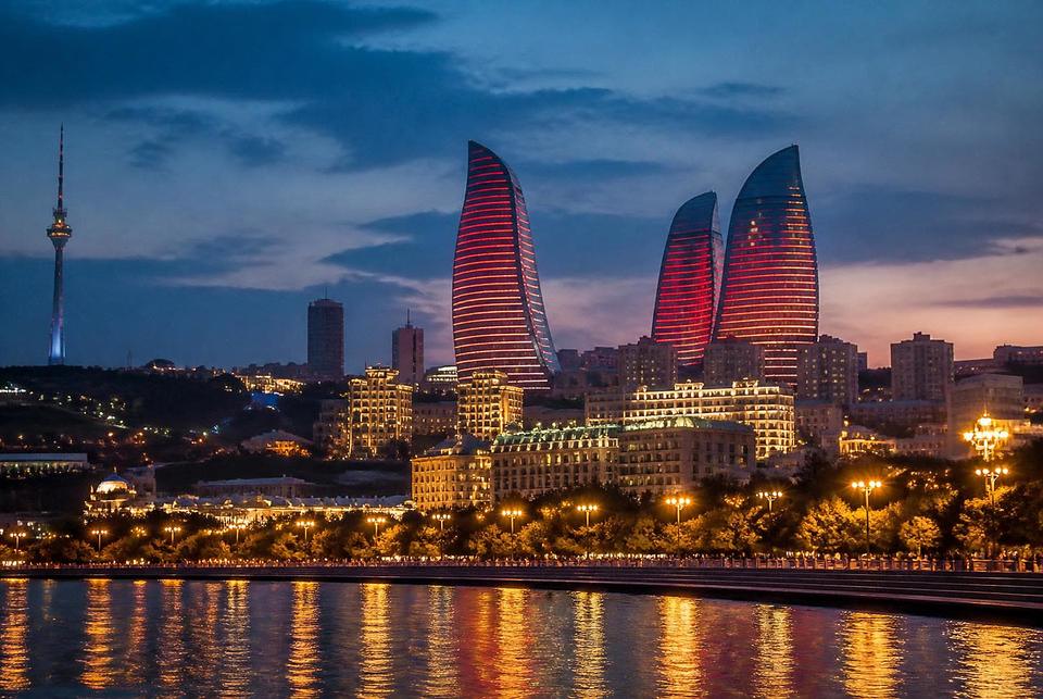 Baku seafront glowing at blue hour